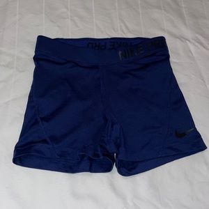 Navy blue Nike pros (S)